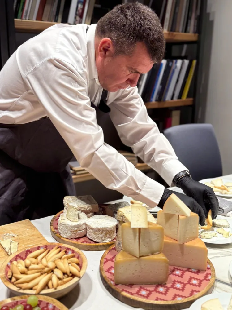 Chef Ramón Nebra preparing a cheese board