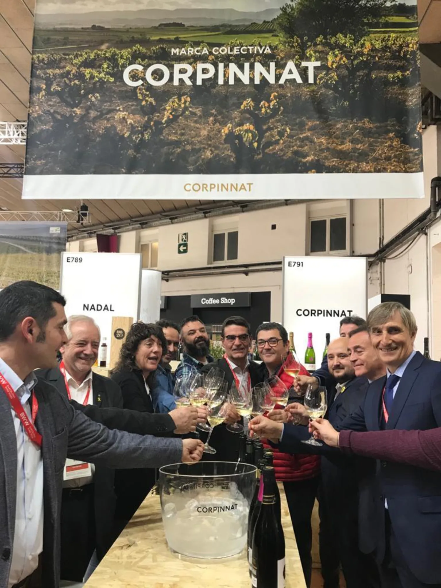 Corpinnat winery representatives toasting at Barcelona Wine Week