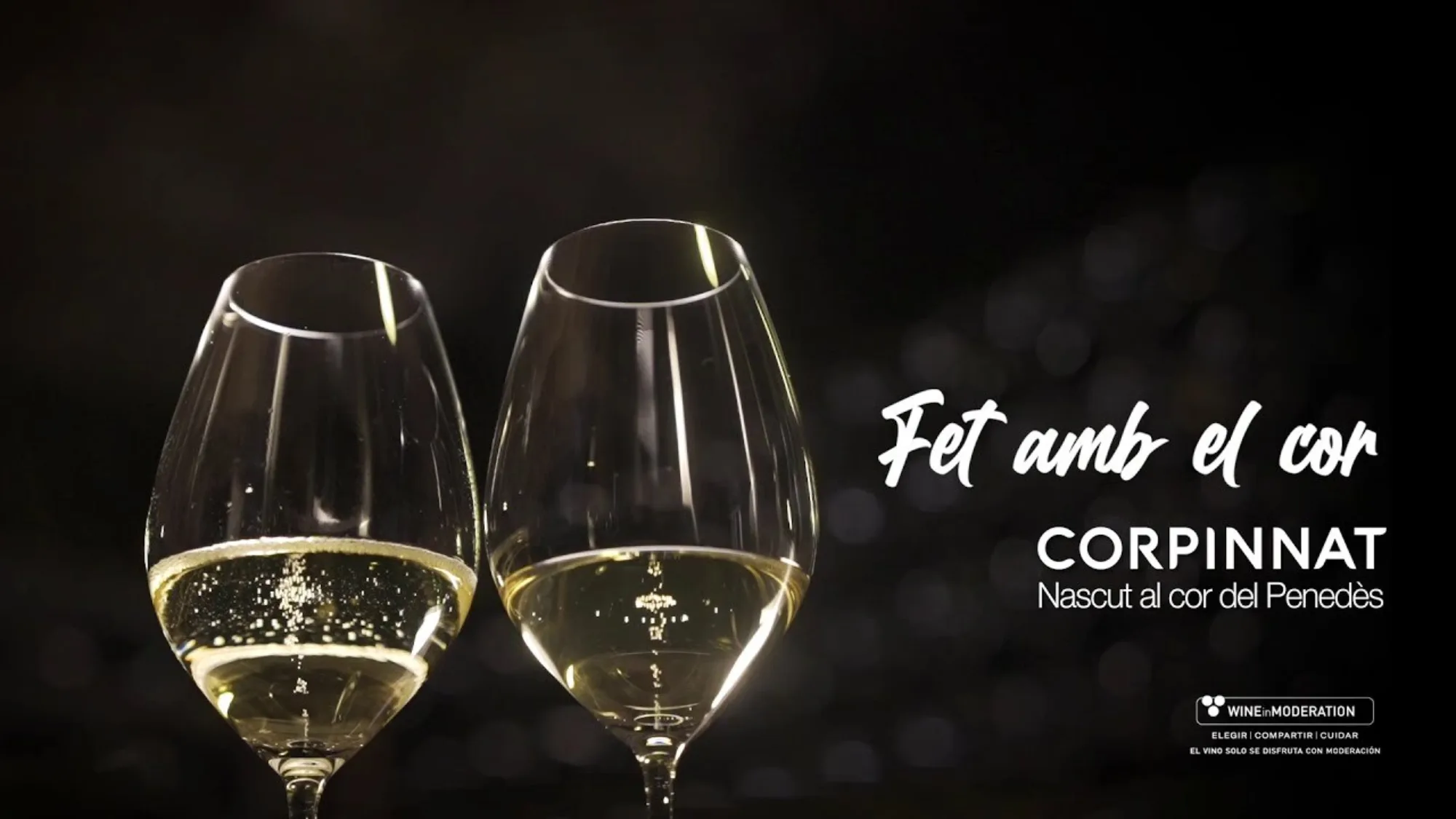 Corpinnat's Fet amb el cor campaign with two glasses of sparkling wine