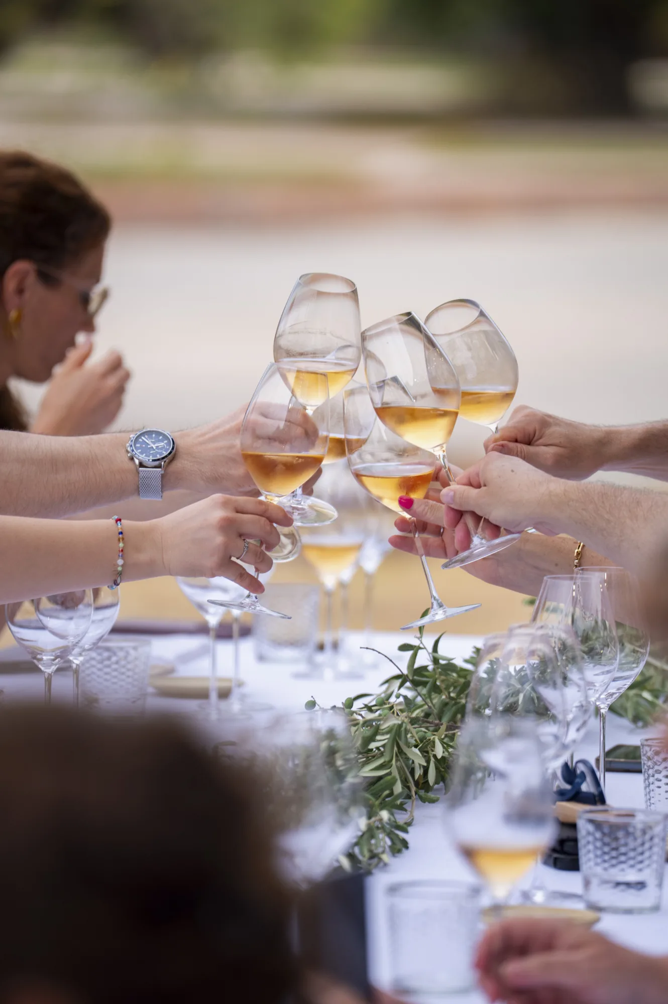 Toasting with corpinnat at a Gastronomic Festival table