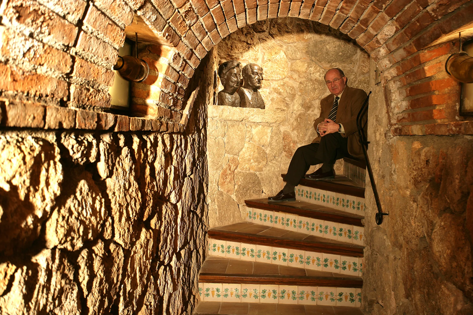 Staircase in the historic cellar of a Corpinnat winery