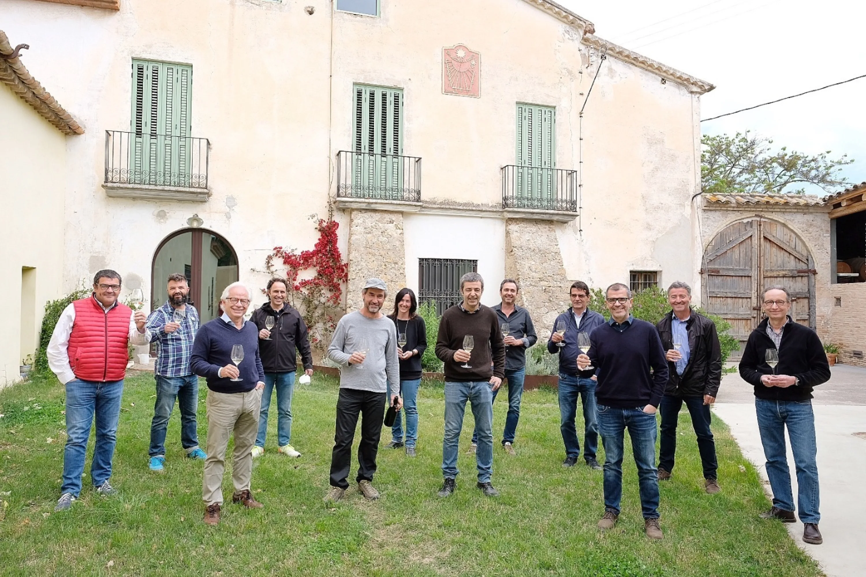 Corpinnat winery representatives outside the Pardas farmhouse