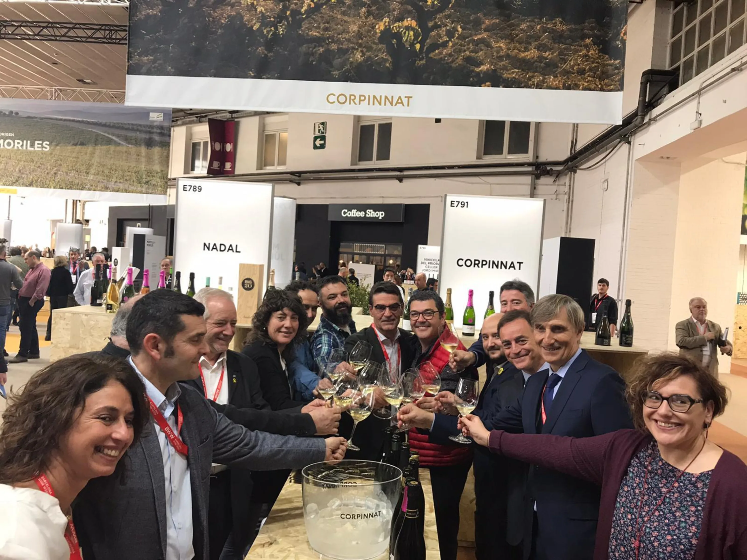 Corpinnat wineries toasting at their stand at the first Barcelona Wine Week