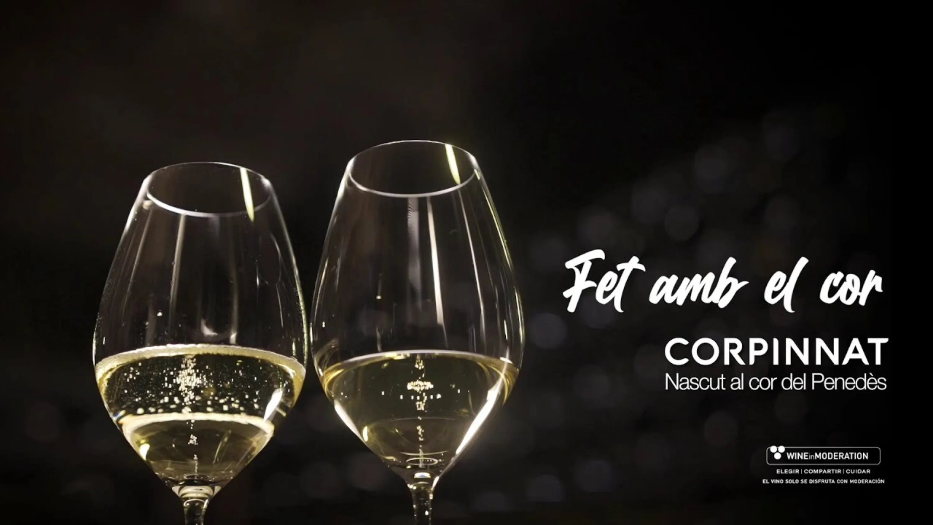 Corpinnat's Fet amb el cor campaign with two glasses of sparkling wine