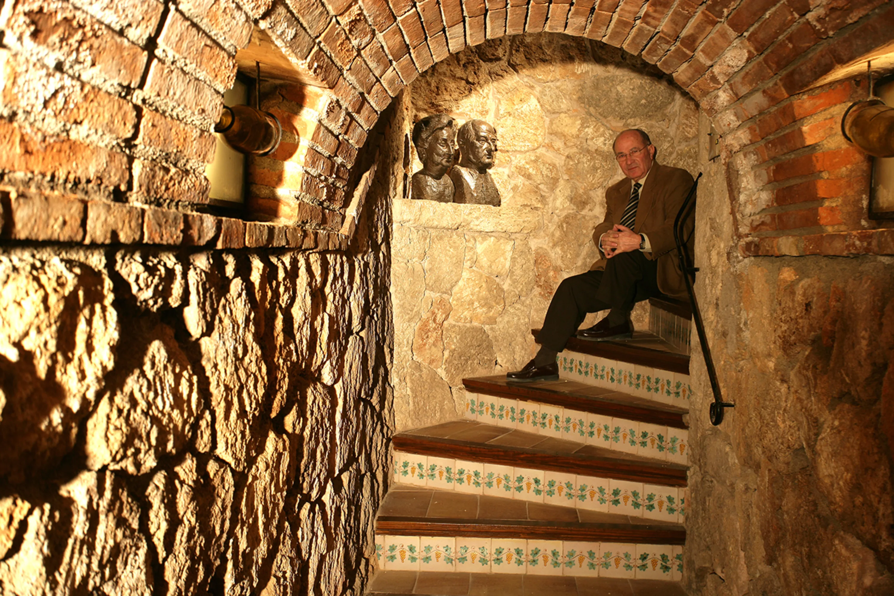 Staircase in the historic cellar of a Corpinnat winery