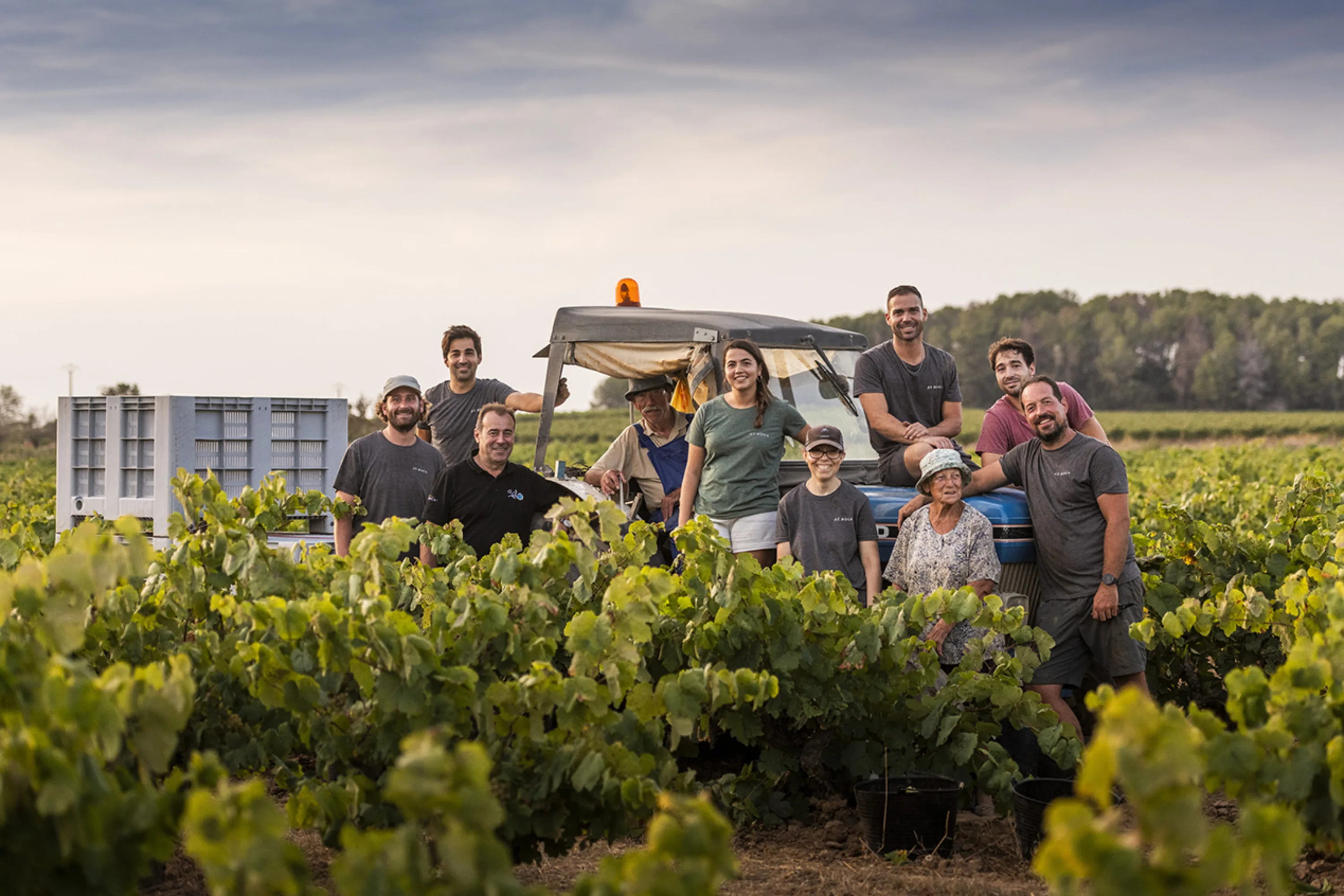Team from a Corpinnat winery in the vineyard