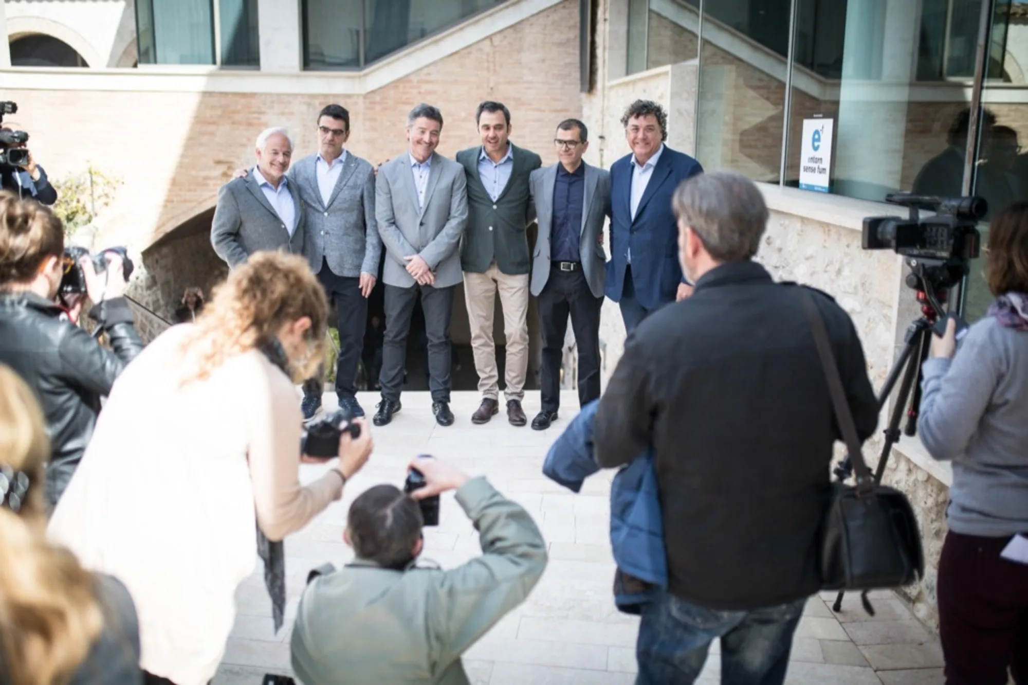 Corpinnat representatives speaking to the press outside a winery